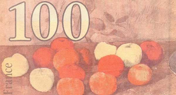 french bank note with cezanne's painting apples and biscuits